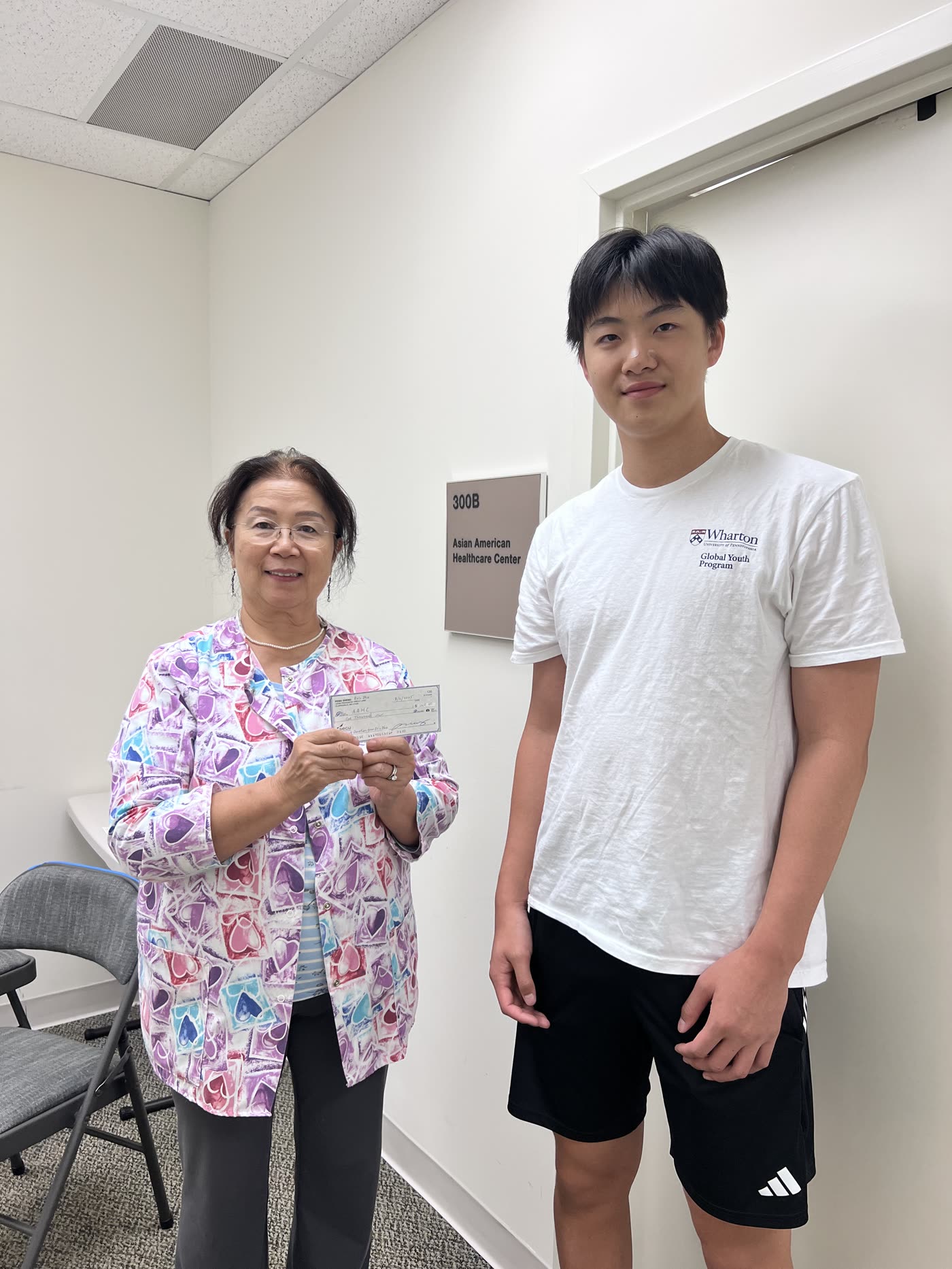 Eric marking the ParkinsonAI partnership with the Asian American Healthcare Center